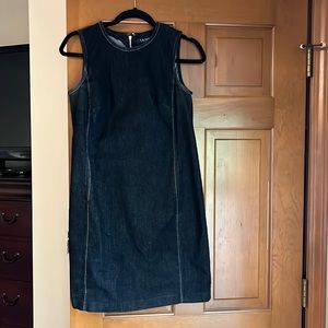 Woman’s black denim dress